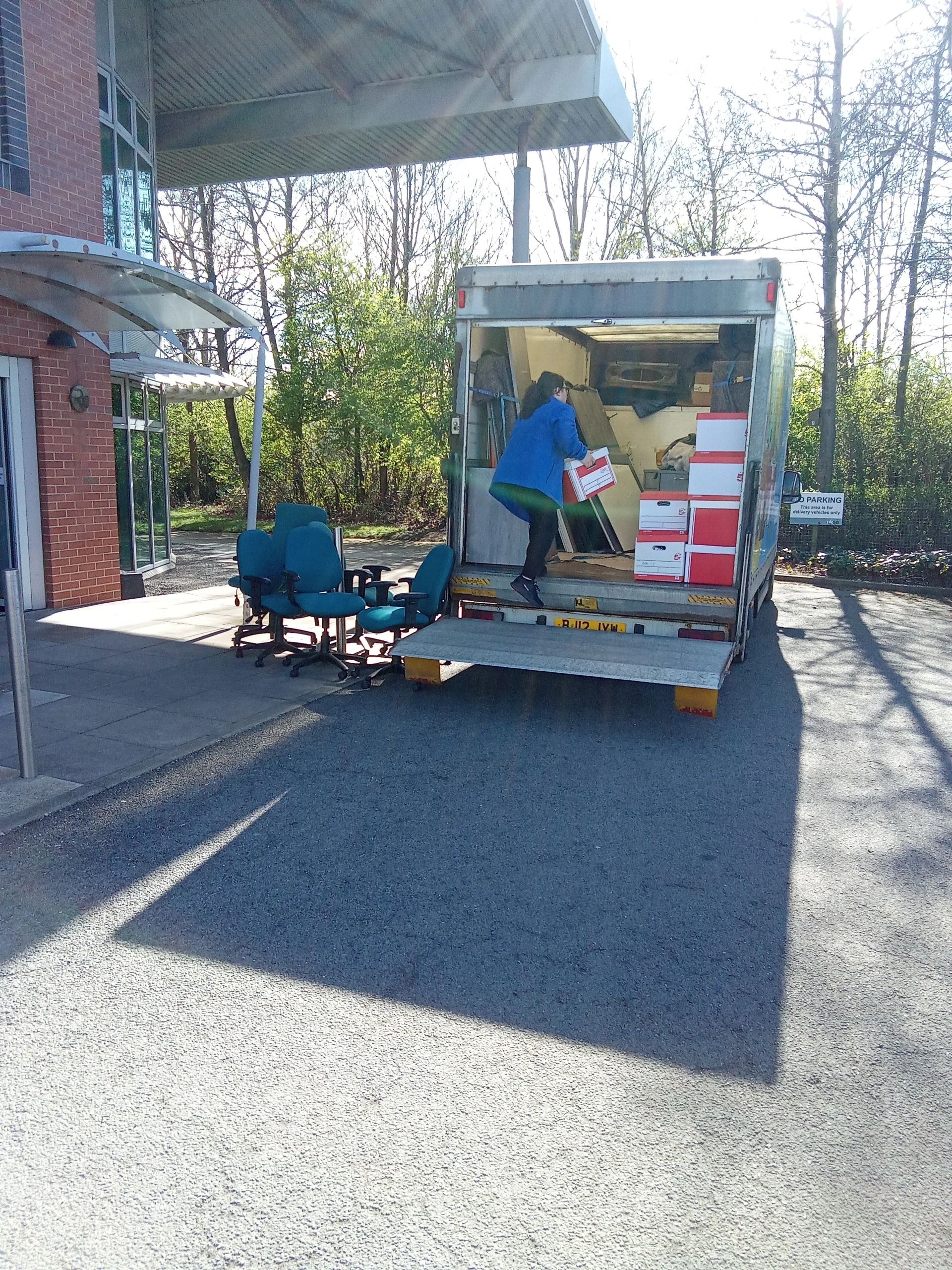 Northeast Removal Services loading office equipment into the van